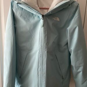 The North Face Jacket insulated lightly. Carto tri climate. Drawstring bottom.